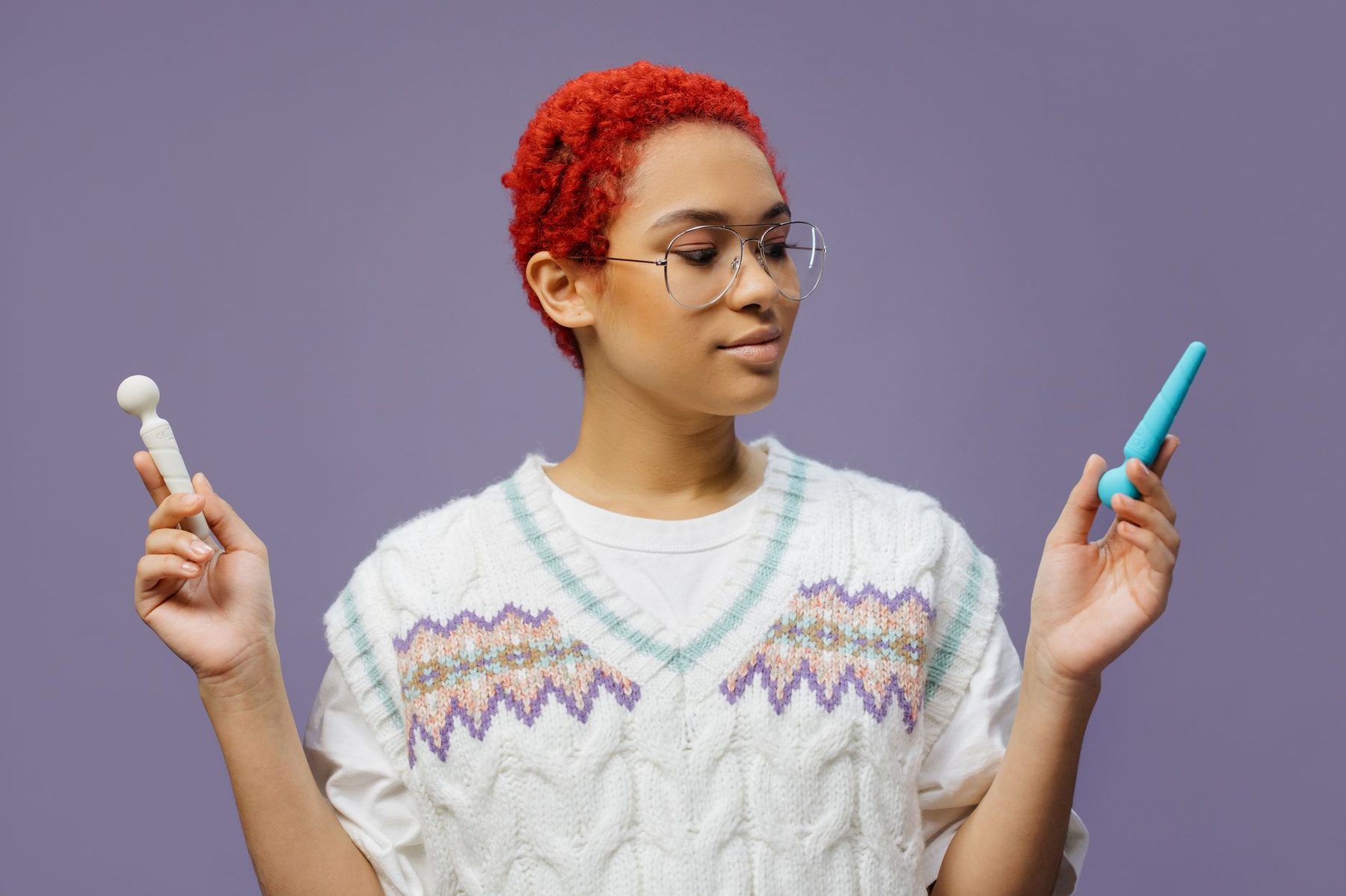 Two different clit tools in hand — compare the job