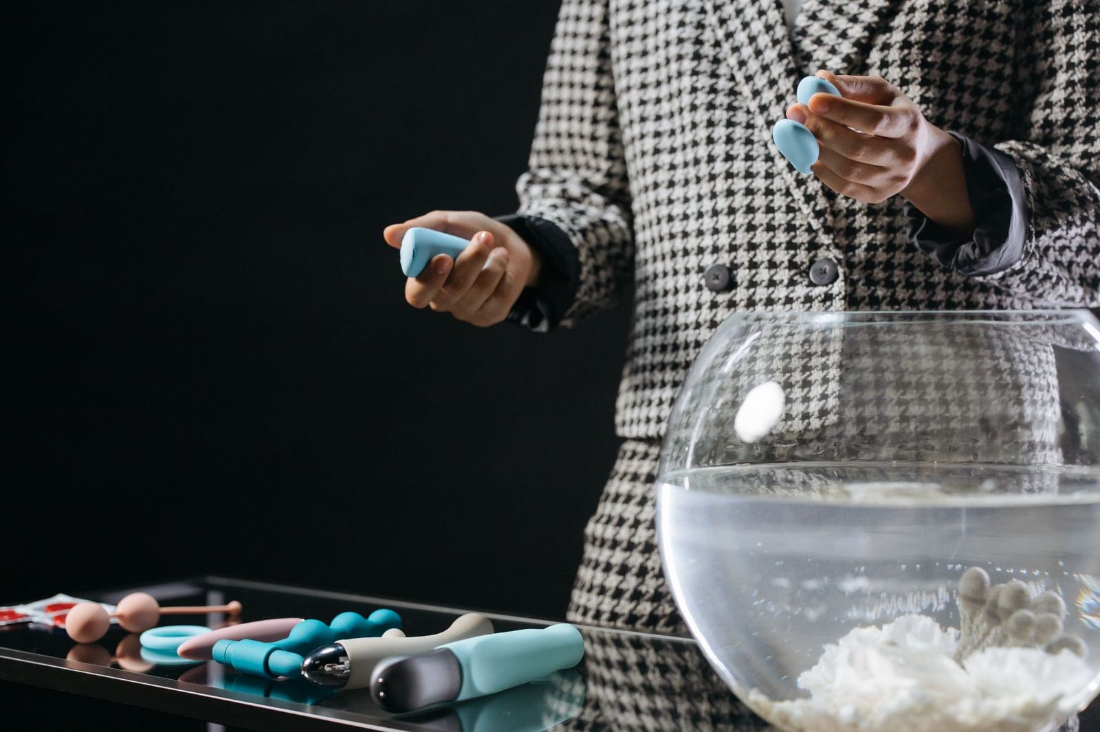 vibrator on counter, phone beside it || vibrator counter phone beside